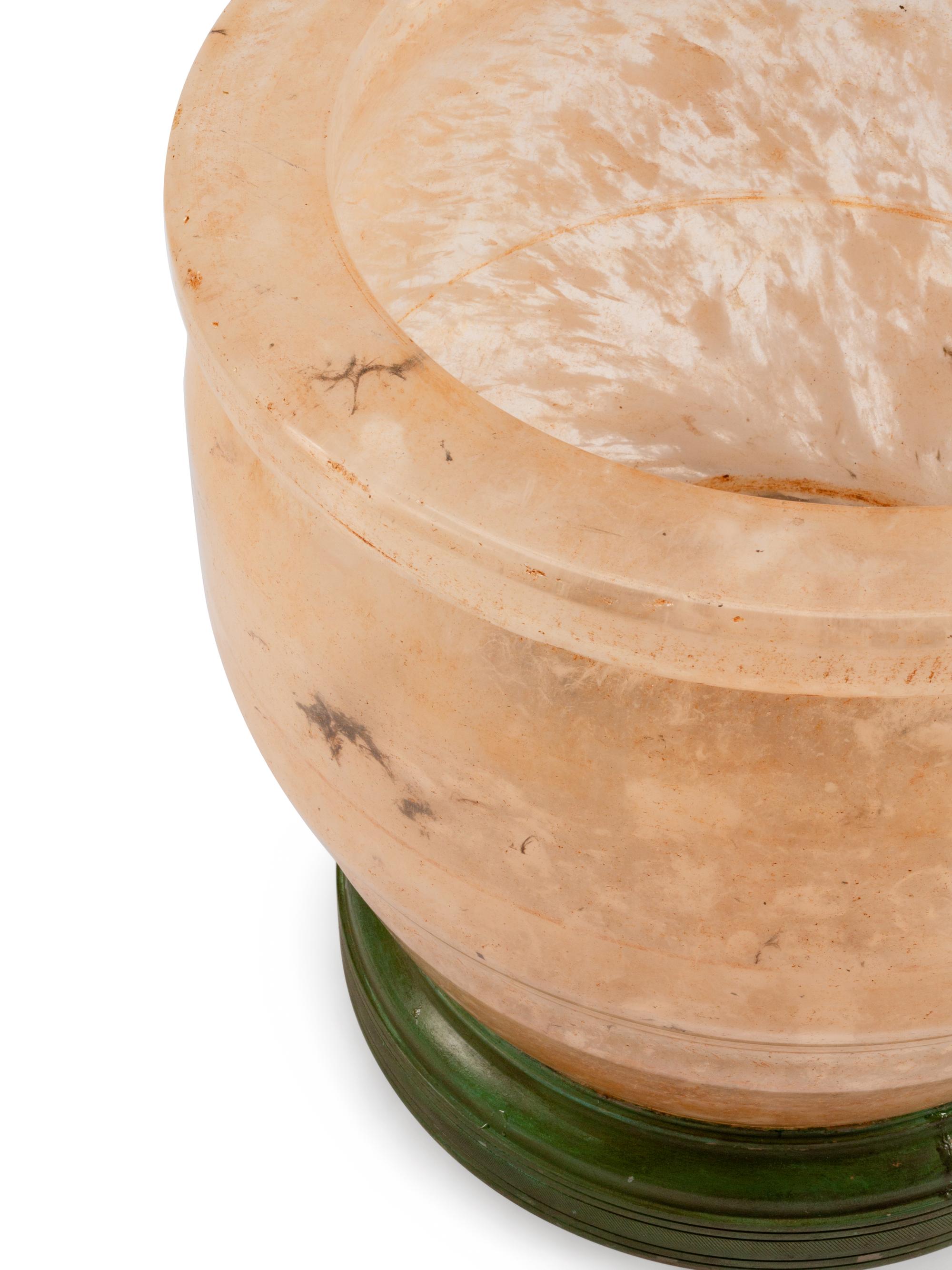 A Large Quartz Bowl on a Patinated Bronze Stand