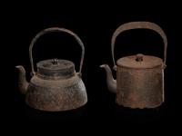 Five Japanese Cast Iron Teapots, Tetsubin , and Burner