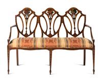 An Edwardian Painted Satinwood Triple-Back Settee and Armchair