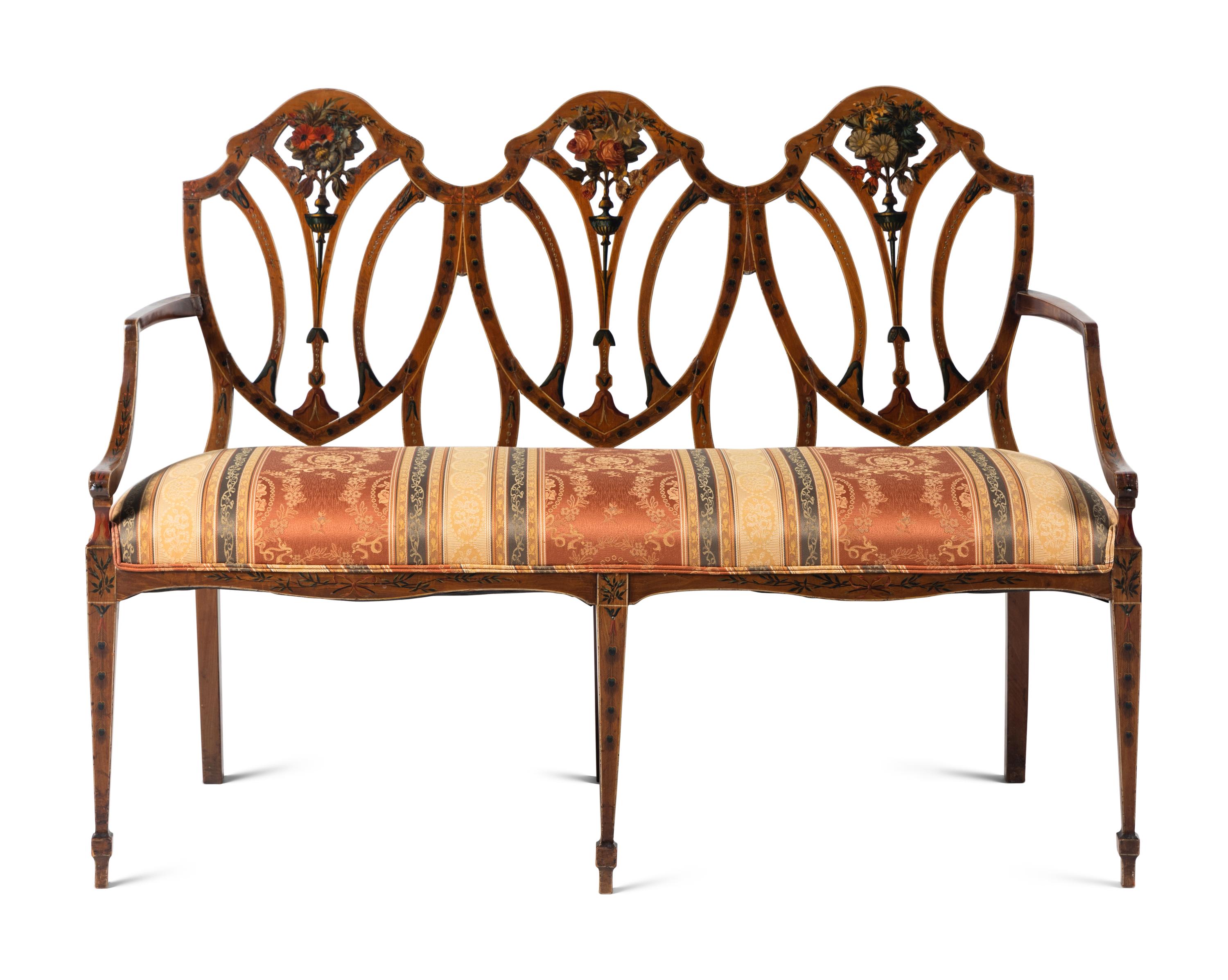 An Edwardian Painted Satinwood Triple-Back Settee and Armchair