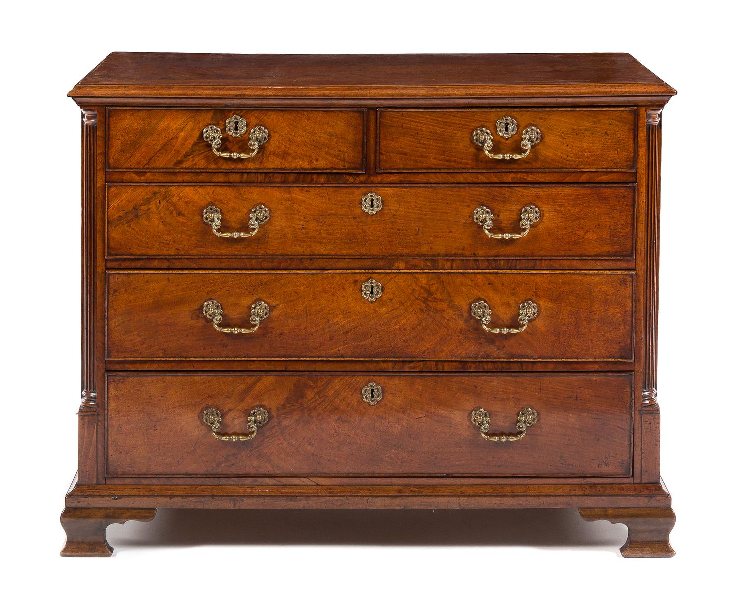 A George II Walnut Chest of Drawers Height 33 1/2 x width 41 3/4 x depth 21 1/2 inches. — CIRCA 1760