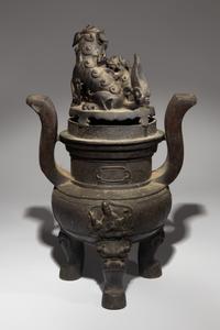 A Bronze Tripod Incense Burner and Cover