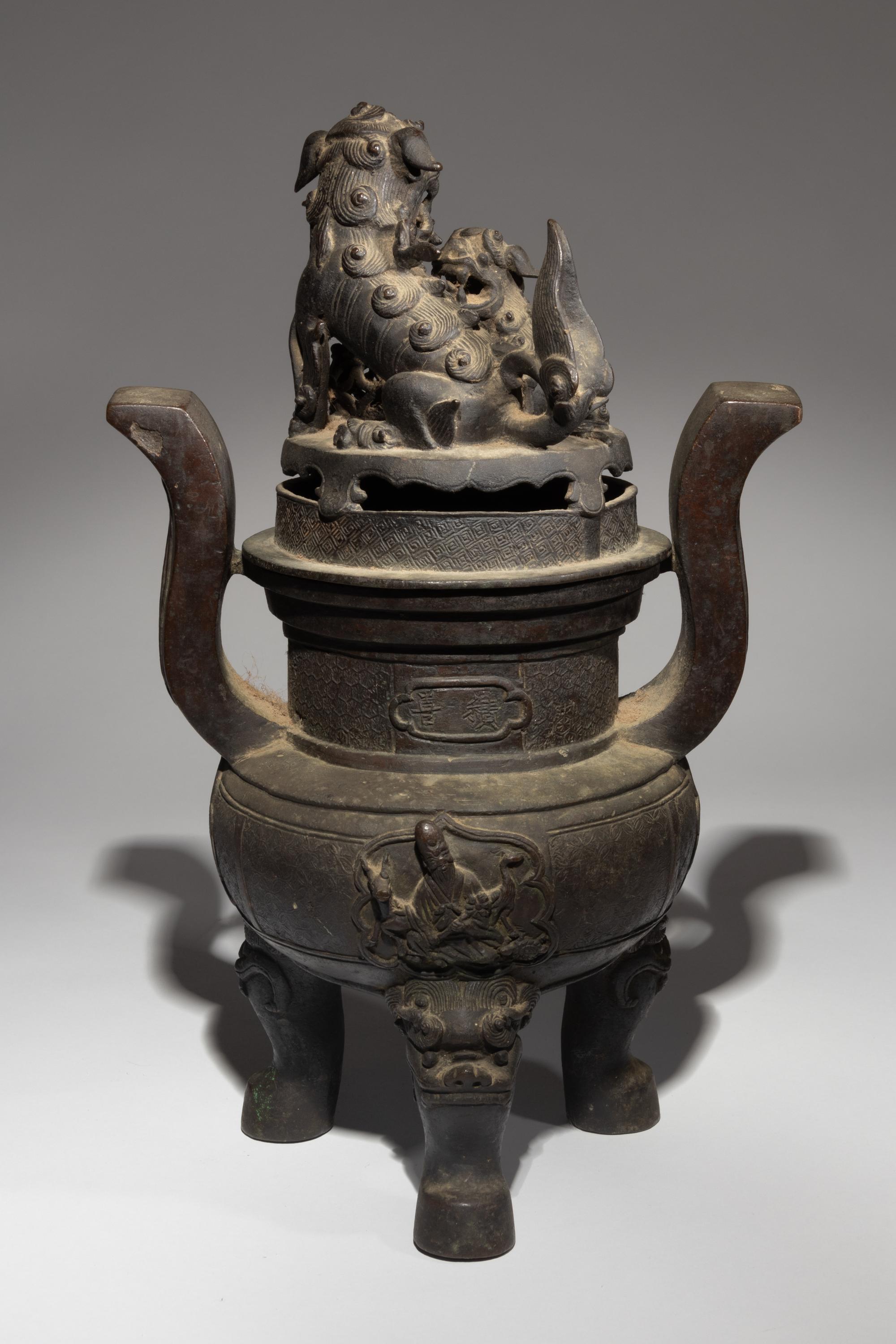 A Bronze Tripod Incense Burner and Cover