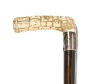 A Japanese Carved Ivory Cane Handle, Height overall 36 3/4 x width of handle 4 1/8 inches.