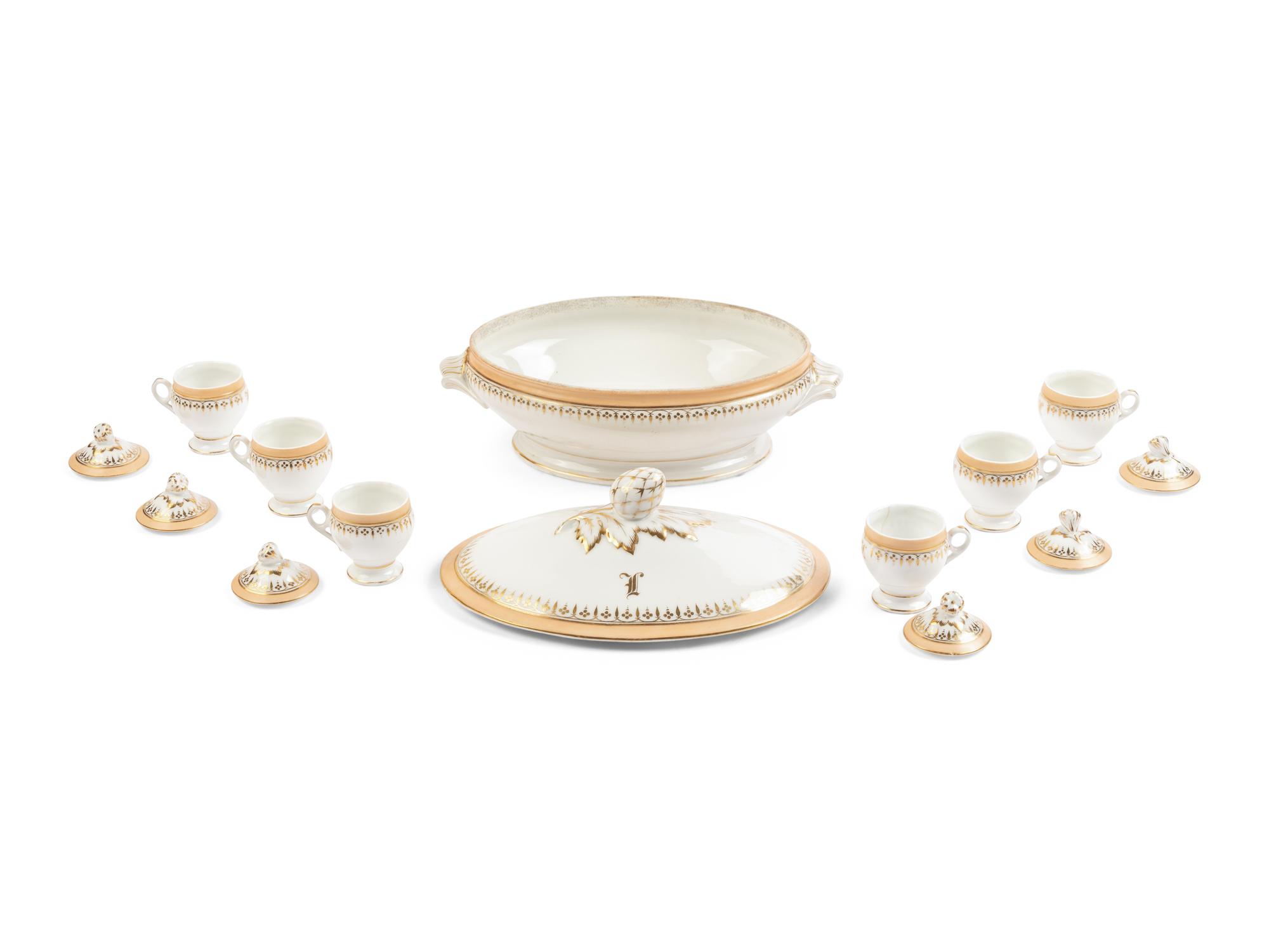 [LINCOLN, Mary Todd (1818-1882)]. A Limoges porcelain buff-ground tureen and cover together with 6 matching pots de crème with covers, purportedly purchased by Mary Todd Lincoln. France, ca. 1865.