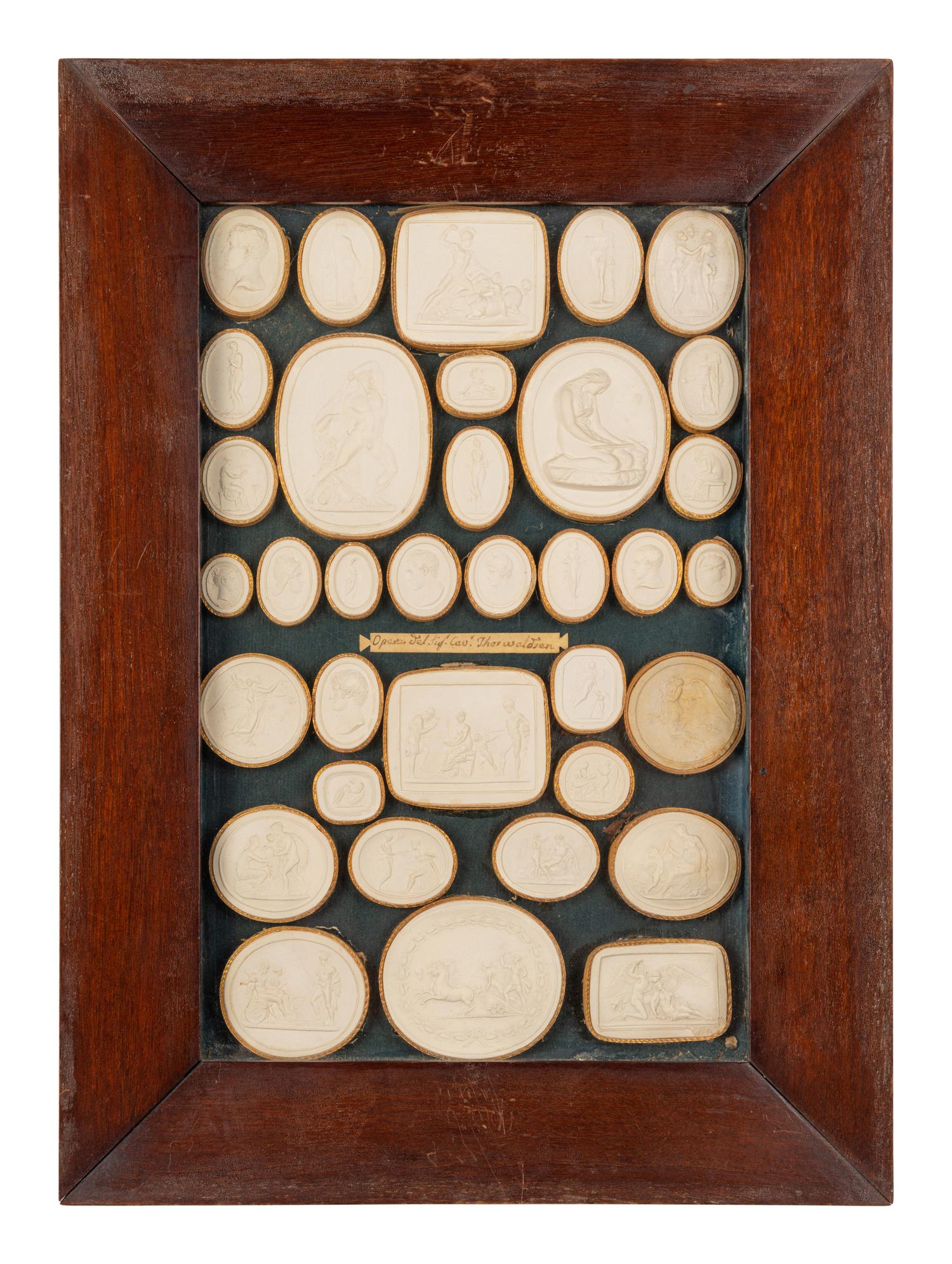 A Collection of Grand Tour Style Plaster Intaglios in Four Frames
