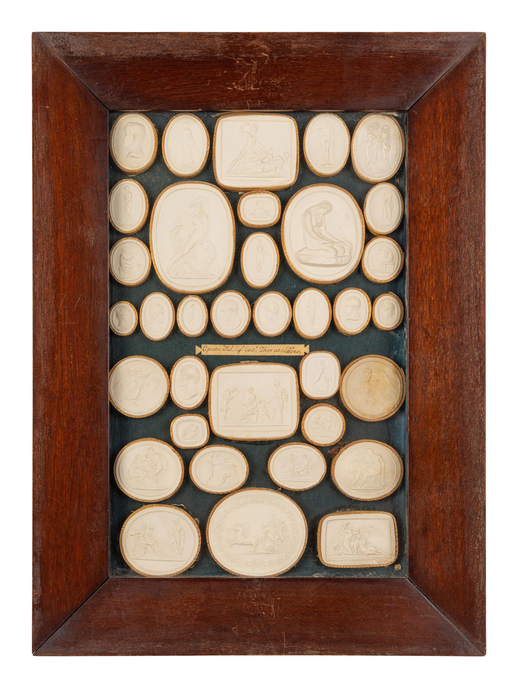 A Collection of Grand Tour Style Plaster Intaglios in Four Frames
