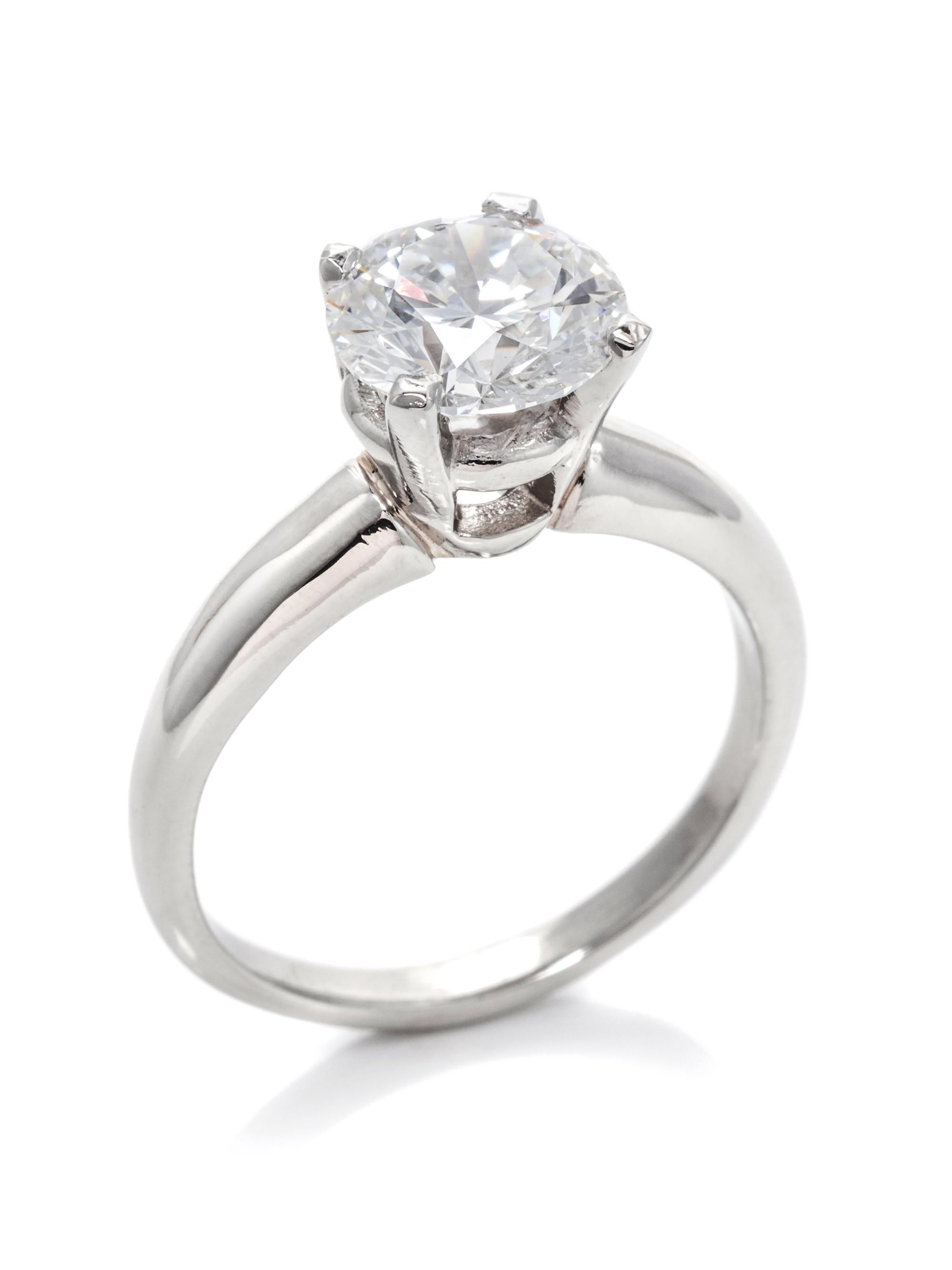 A Platinum and Diamond Solitaire Ring,