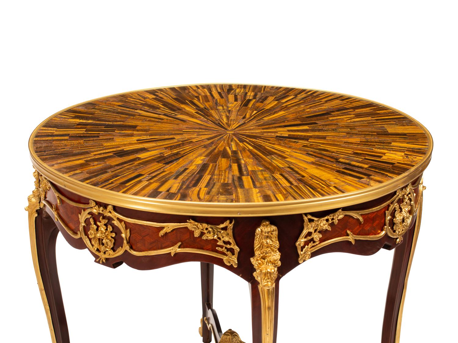 A Pair of Louis XV Style Gilt Bronze Mounted Gueridons with Tiger's Eye Tops
