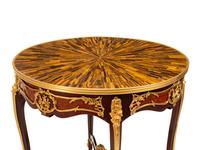 A Pair of Louis XV Style Gilt Bronze Mounted Gueridons with Tiger's Eye Tops