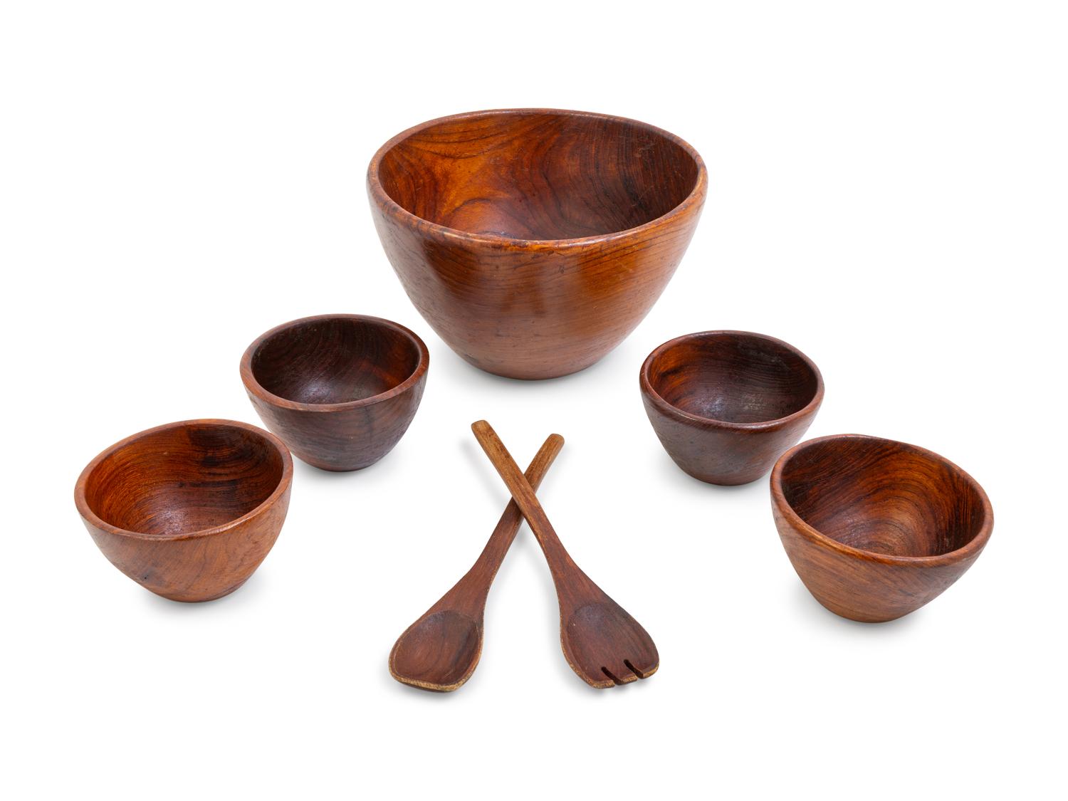 A Carved Wood Salad Serving Set