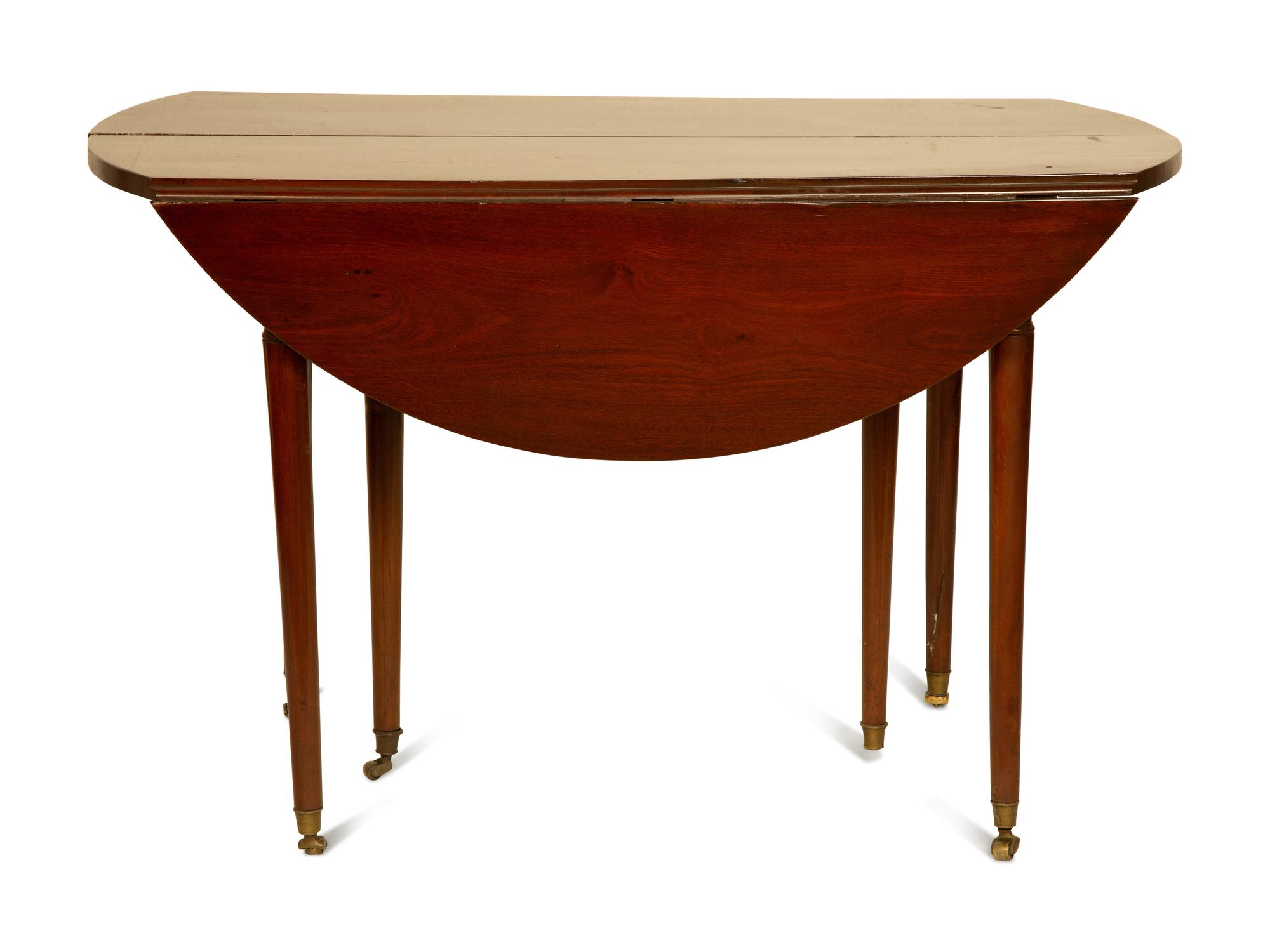 A Directoire Mahogany Drop-Leaf Dining Table