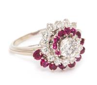 A 14 Karat White Gold, Diamond and Ruby Ring, 4.20 dwts.