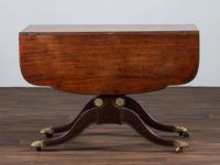 A Classical Brass-Mounted Walnut and Mahogany Pembroke Table