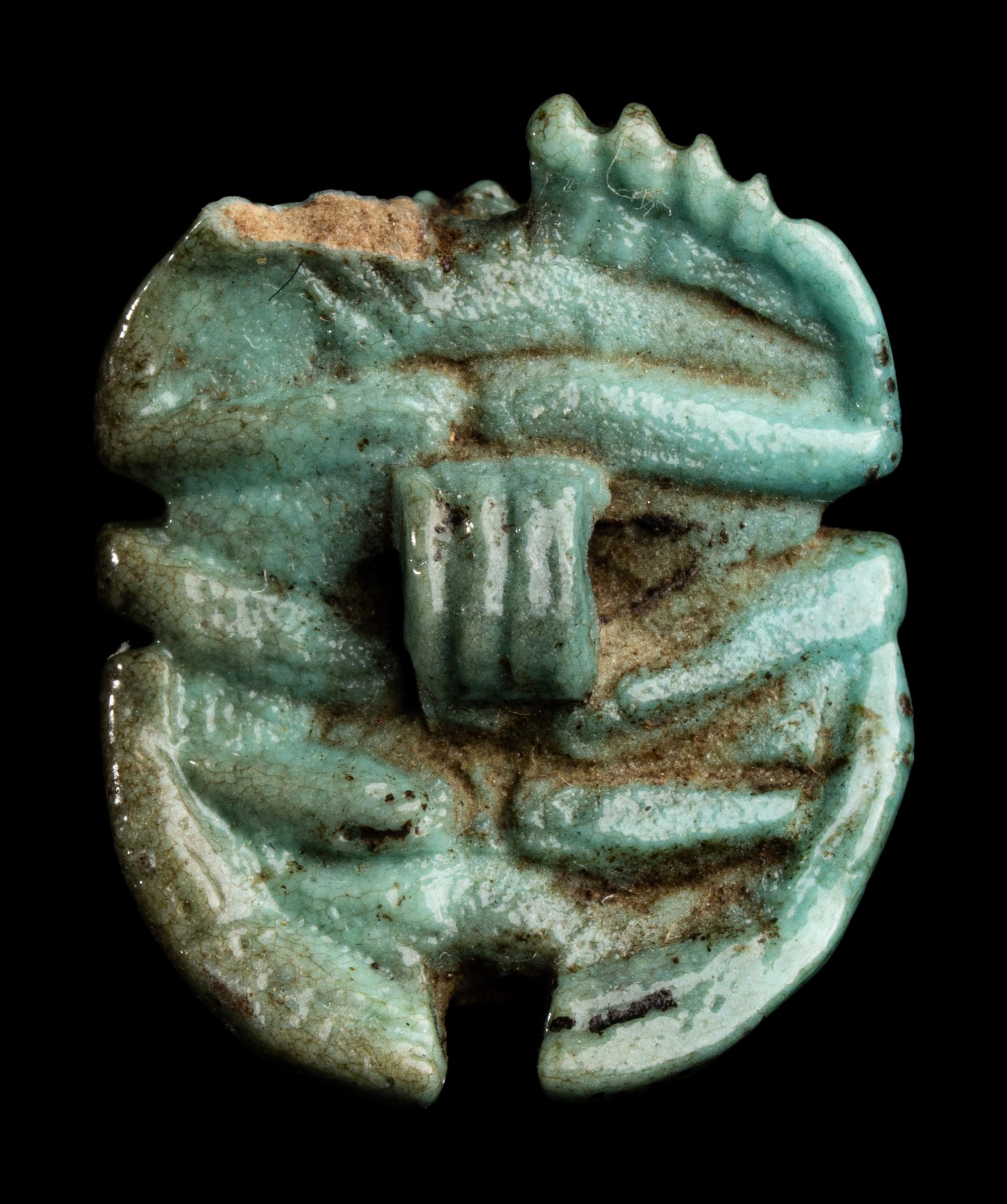 An Egyptian Faience Scarab