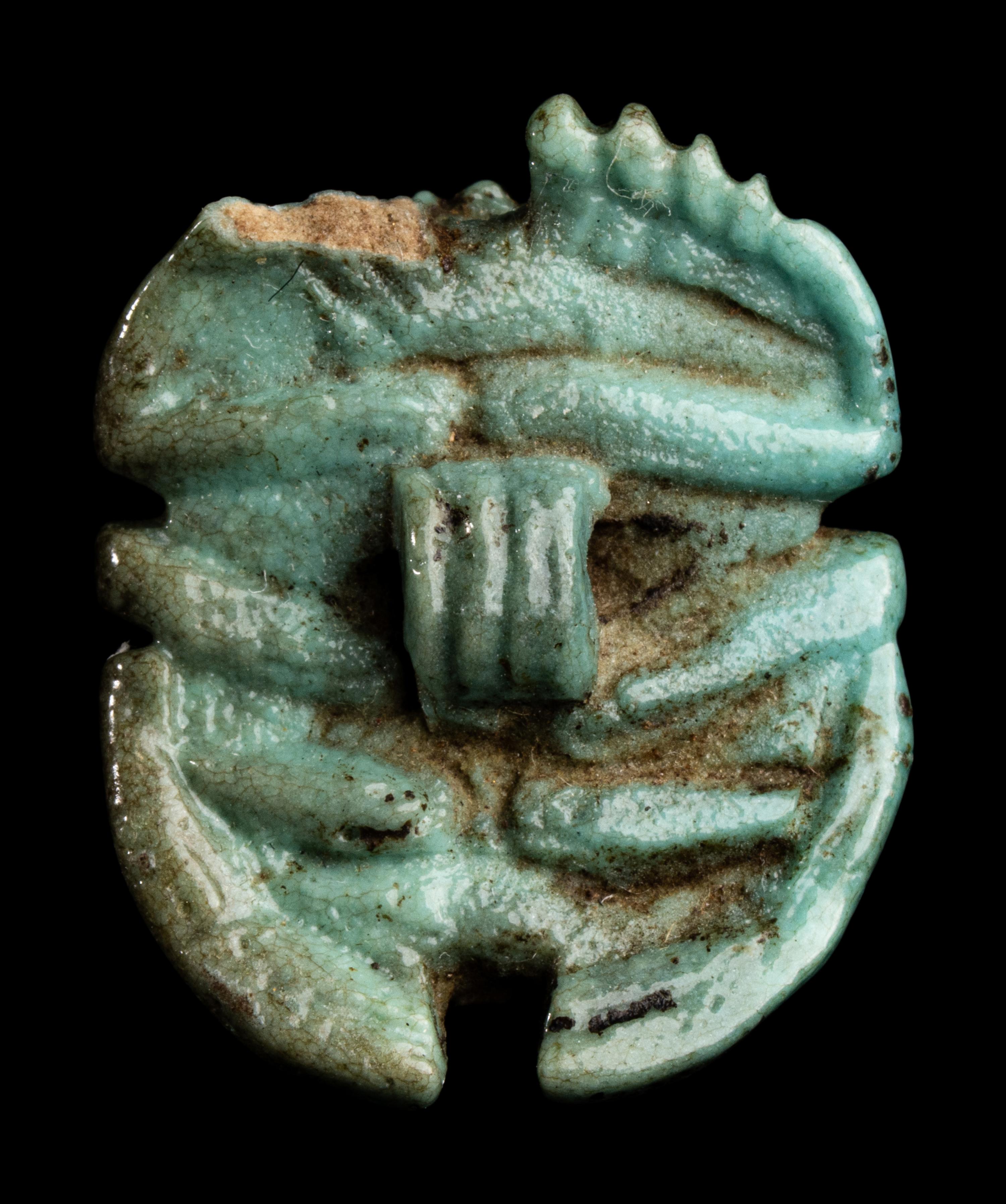 An Egyptian Faience Scarab