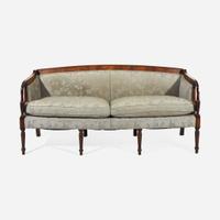A Federal style carved and inlaid mahogany sofa