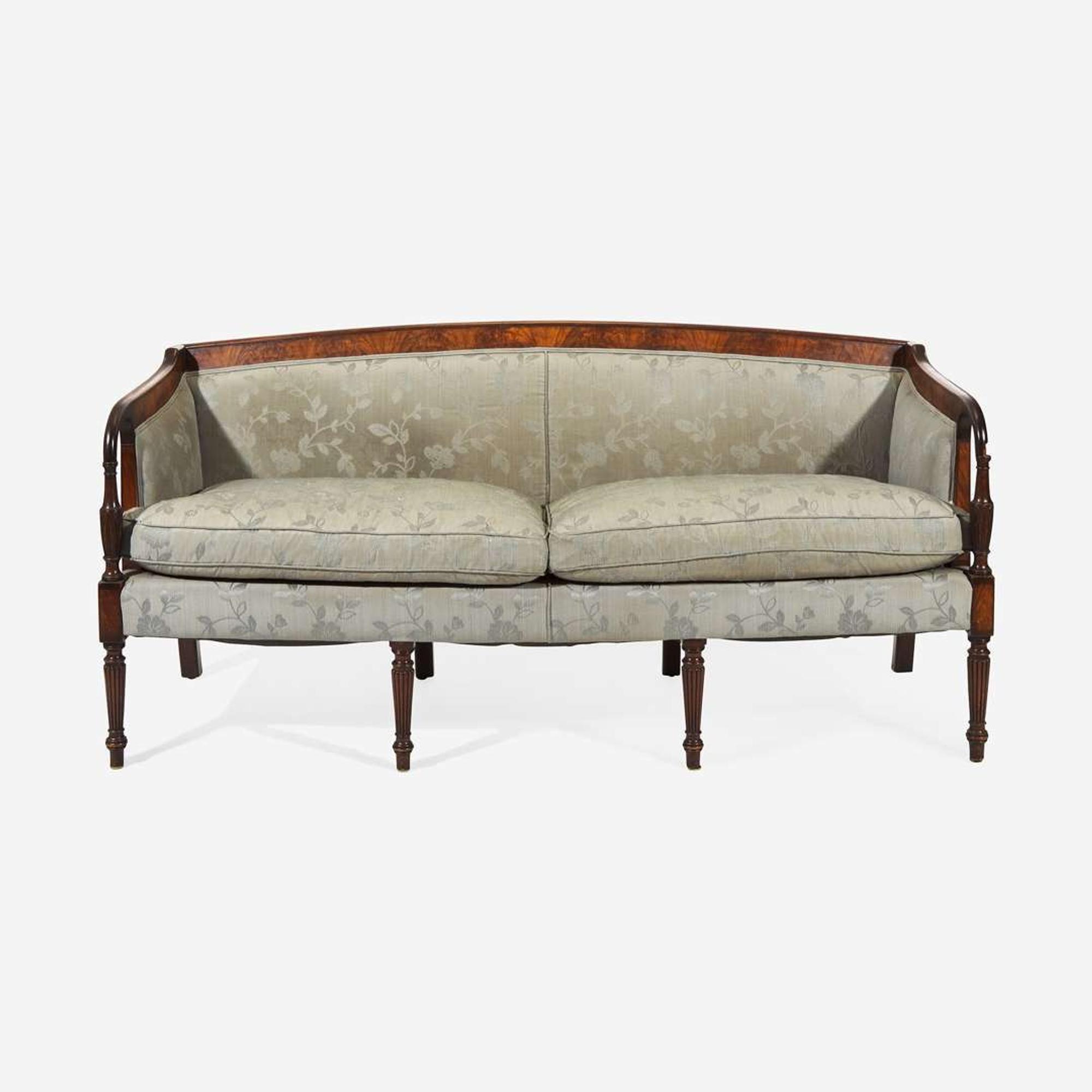 A Federal style carved and inlaid mahogany sofa