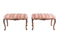 A Pair of Louis XV Style Walnut Banquettes
