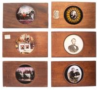 [LINCOLNIANA - MAGIC LANTERN SLIDES]. A collection of 65 assorted glass slides depicting important subjects and scenes depicting the life, death, and legacy of Abraham Lincoln, including: