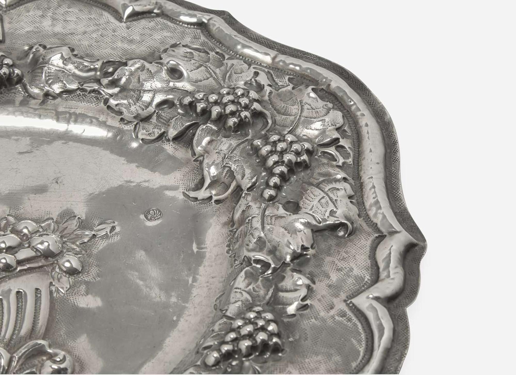 A silver repoussé Kiddush plaque, 20th century