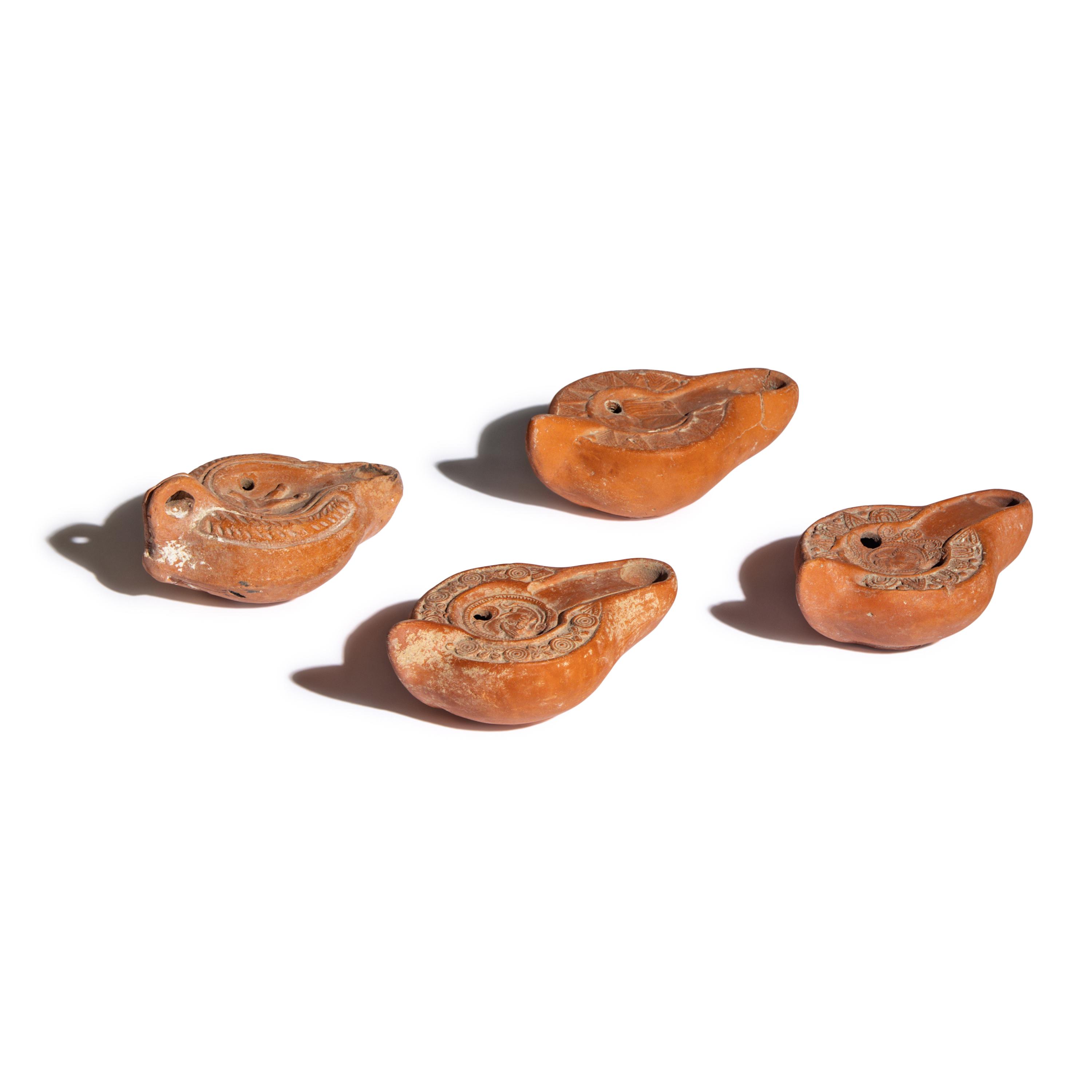 Four Roman Terracotta Lamps