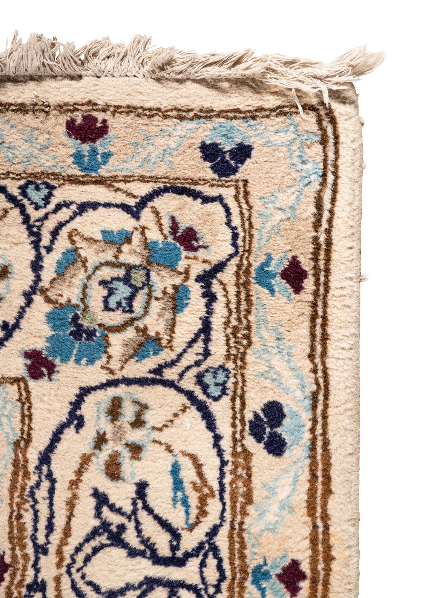 A Persian Nain Wool Rug