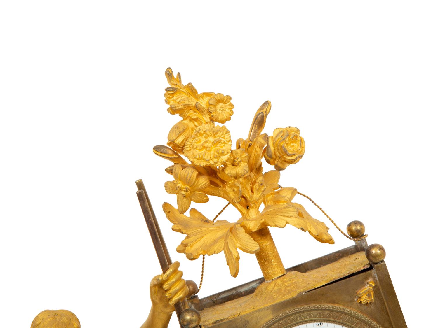 A Restauration Gilt and Patinated Bronze "Gardener" Clock