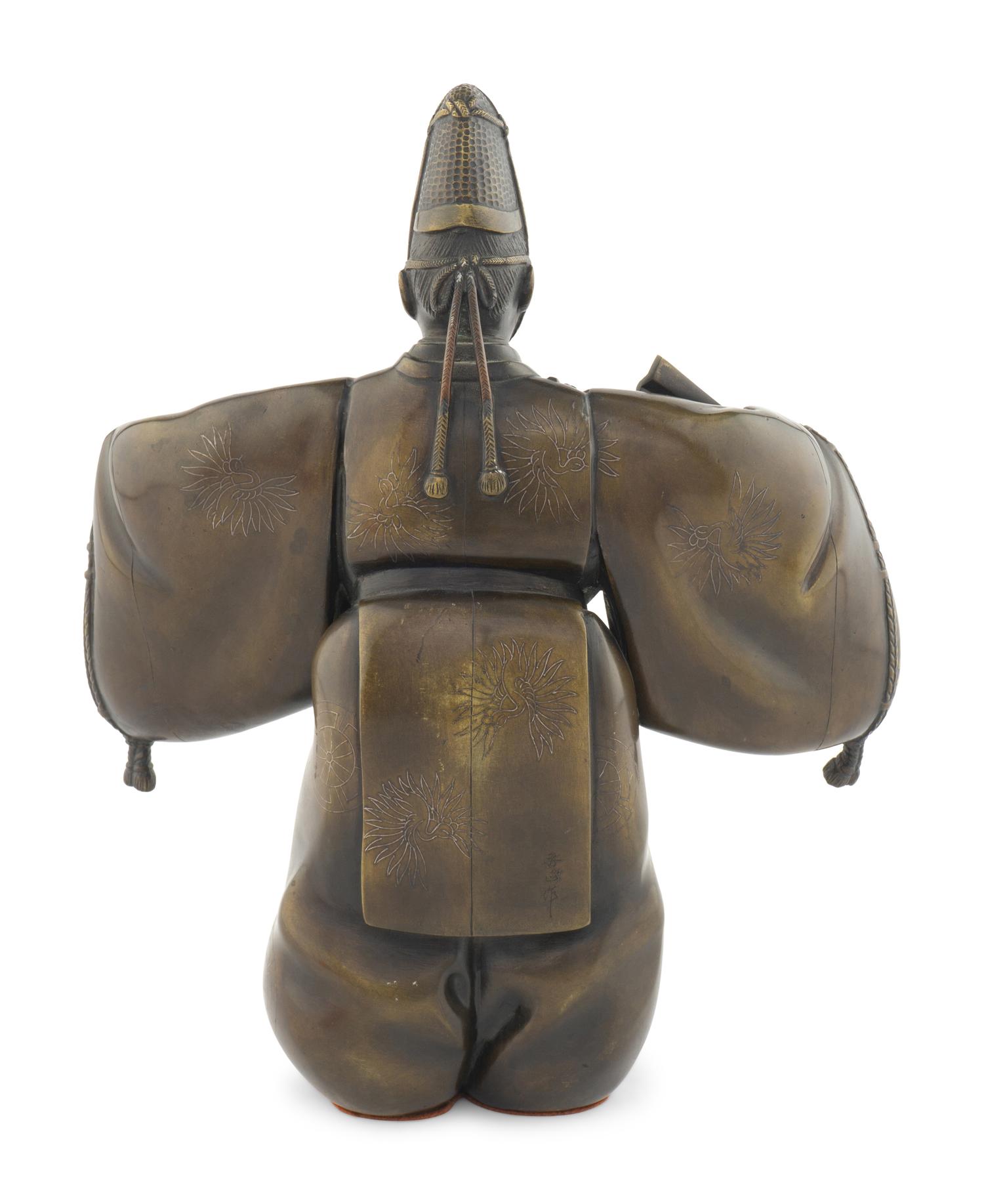 A Japanese Bronze Figure