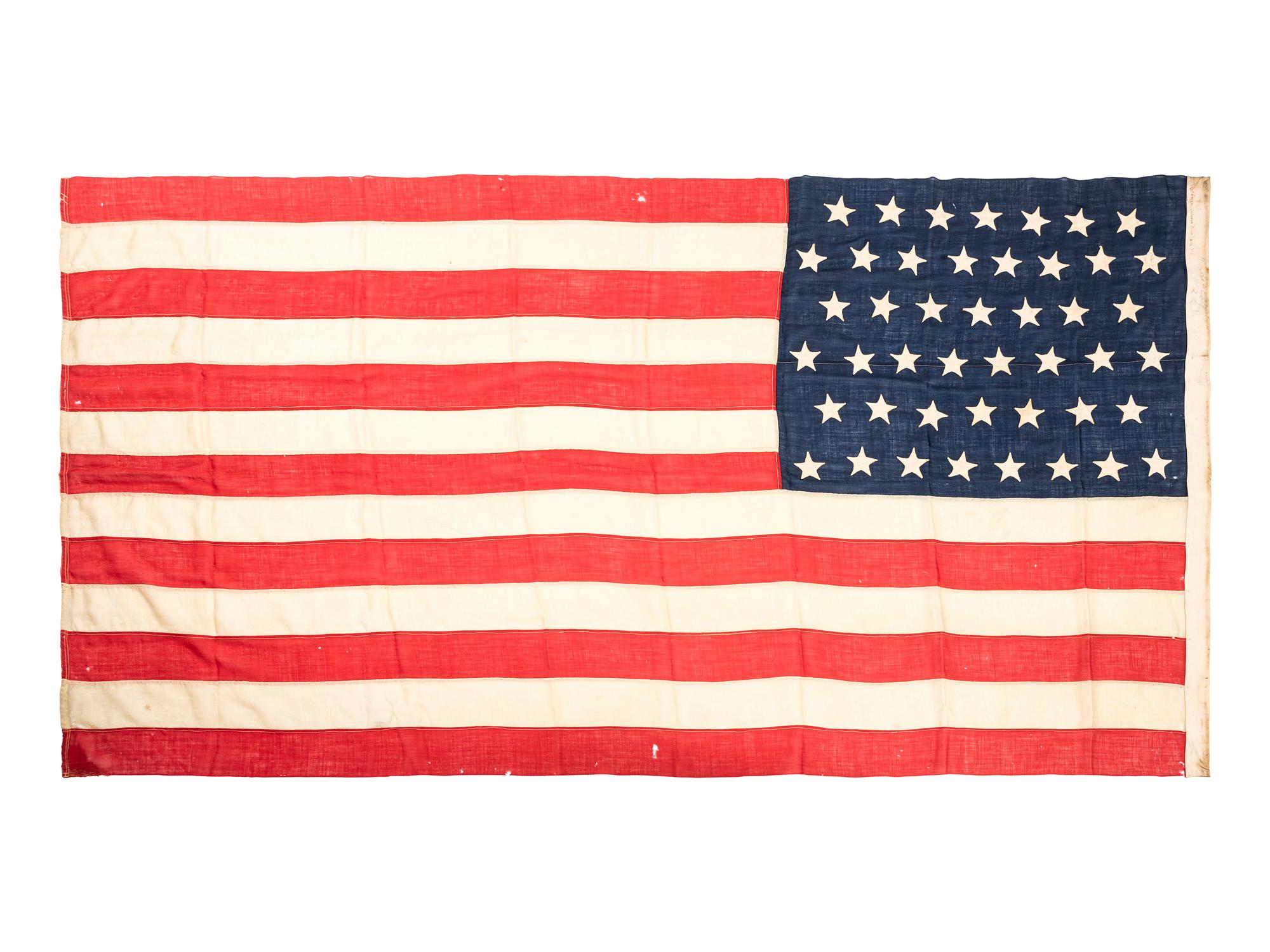 [FLAGS]. A group of 2 American flags, incl. 45-star and 48-star examples. Late 19th-early 20th century.
