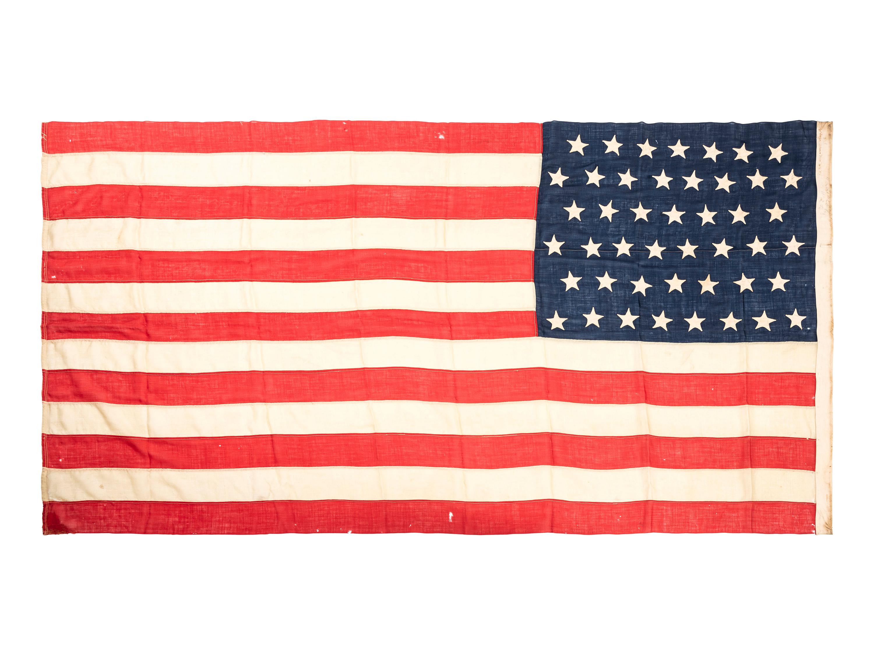 [FLAGS]. A group of 2 American flags, incl. 45-star and 48-star examples. Late 19th-early 20th century.