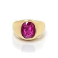 YELLOW GOLD AND INTENSE PURPLISH PINK SAPPHIRE RING
