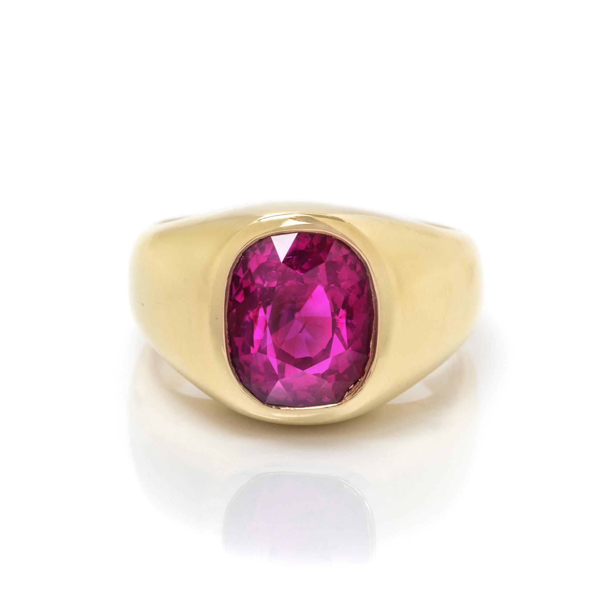 YELLOW GOLD AND INTENSE PURPLISH PINK SAPPHIRE RING