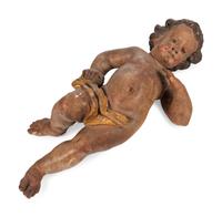 A Painted and Parcel Gilt Wood Figure of a Putto