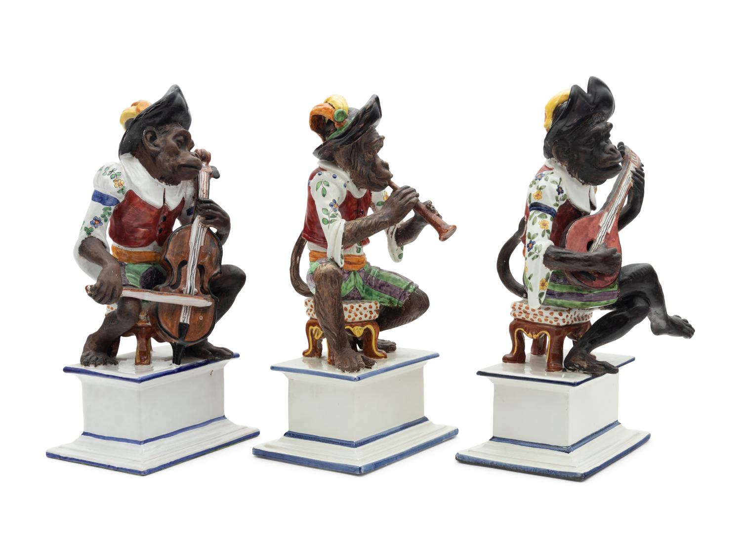 A Set of Three Italian Majolica Monkey Band Figures