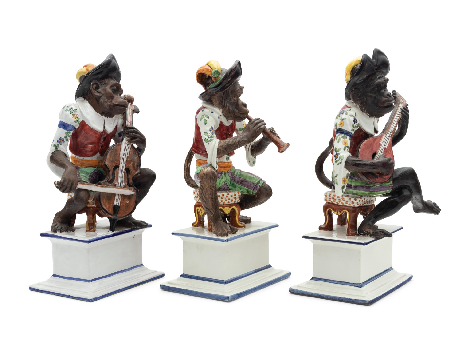 A Set of Three Italian Majolica Monkey Band Figures