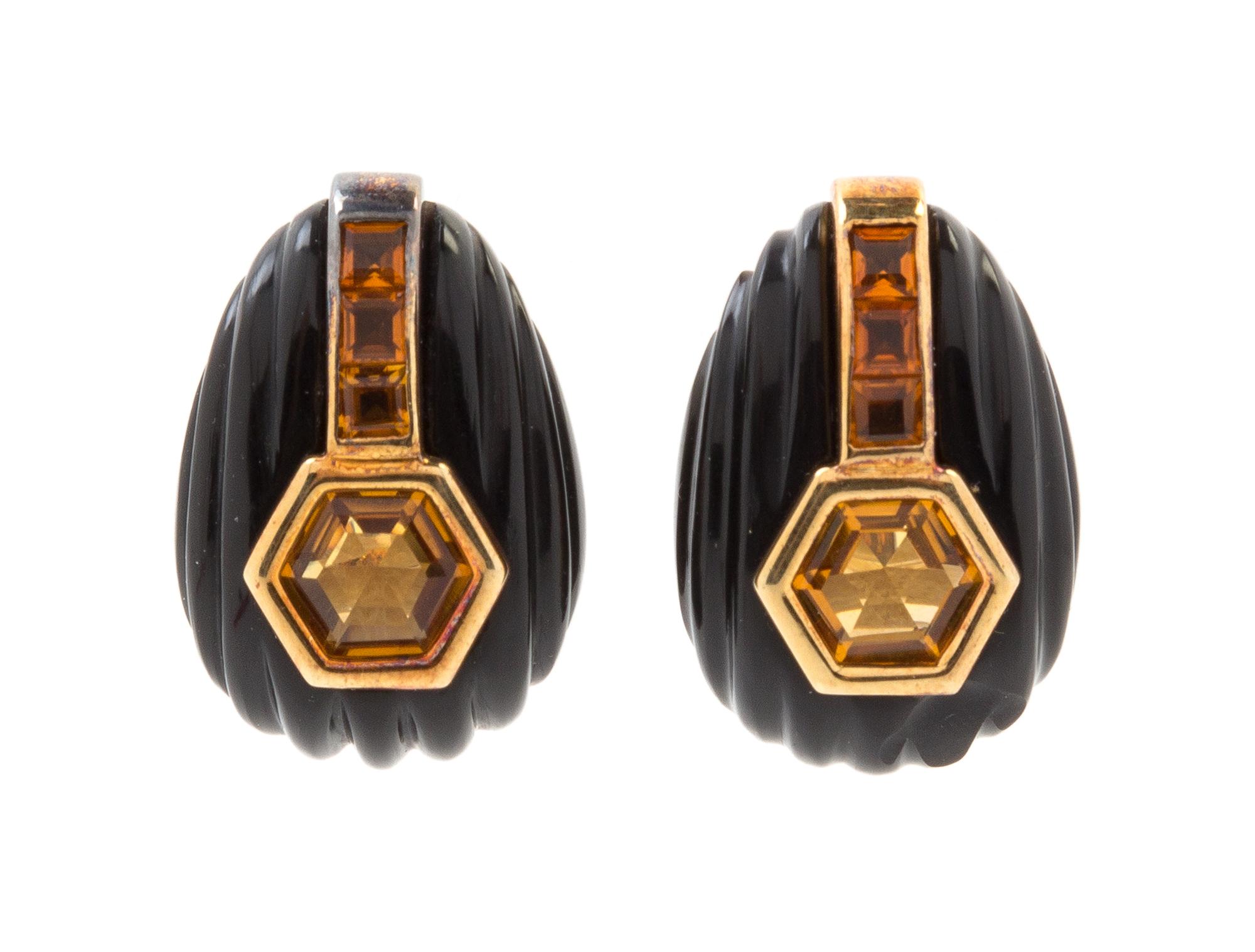 A Collection of 14 Karat Yellow Gold, Onyx and Citrine Jewelry, 23.20 dwts.