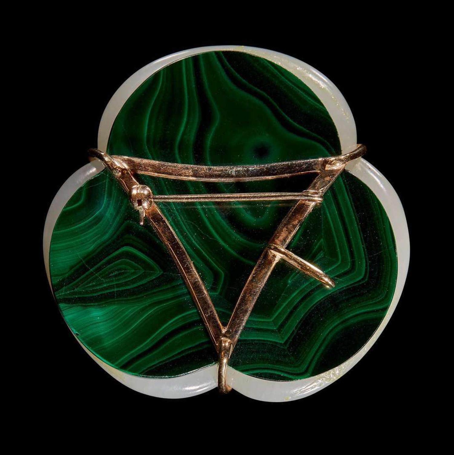 A Chinese white jade "three qilong" pendant 三螭龍玉珮