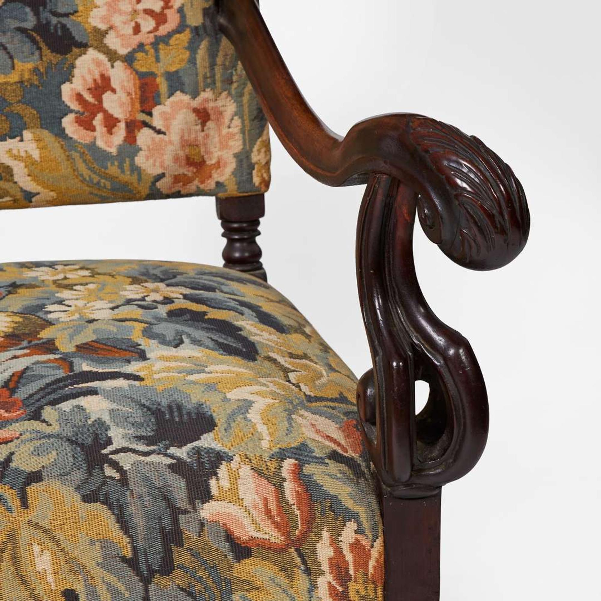 A pair of Baroque Revival carved walnut armchairs late 19th / 20th century