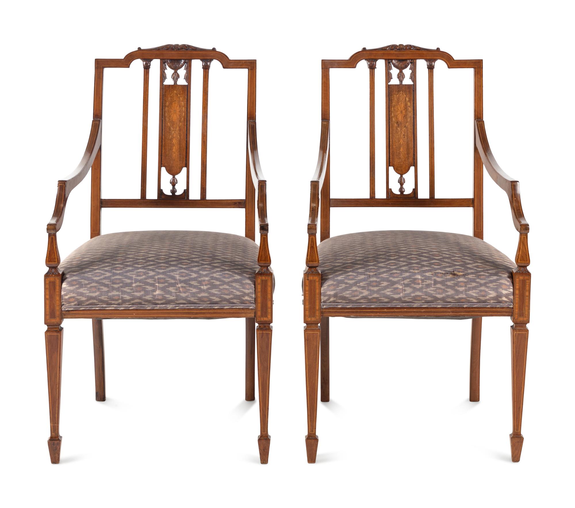 A Pair of Edwardian Mahogany and Marquetry Armchairs