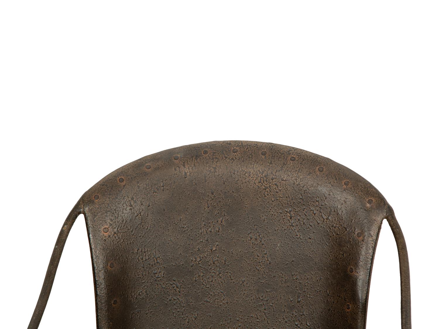 A Set of Seven Patinated Metal Dining Chairs