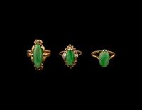 Three Chinese Apple Green Inset Gold Mounted Rings