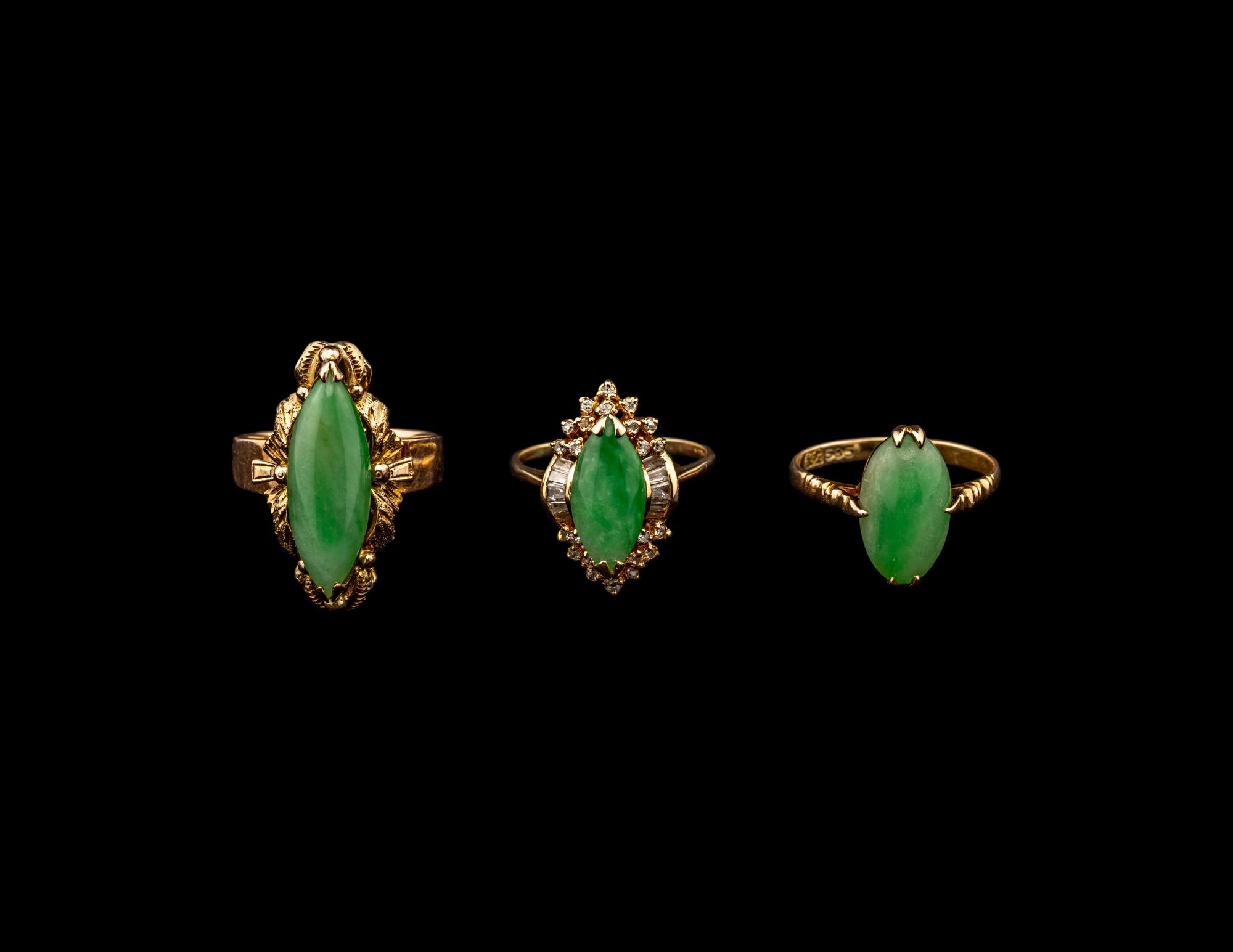 Three Chinese Apple Green Inset Gold Mounted Rings