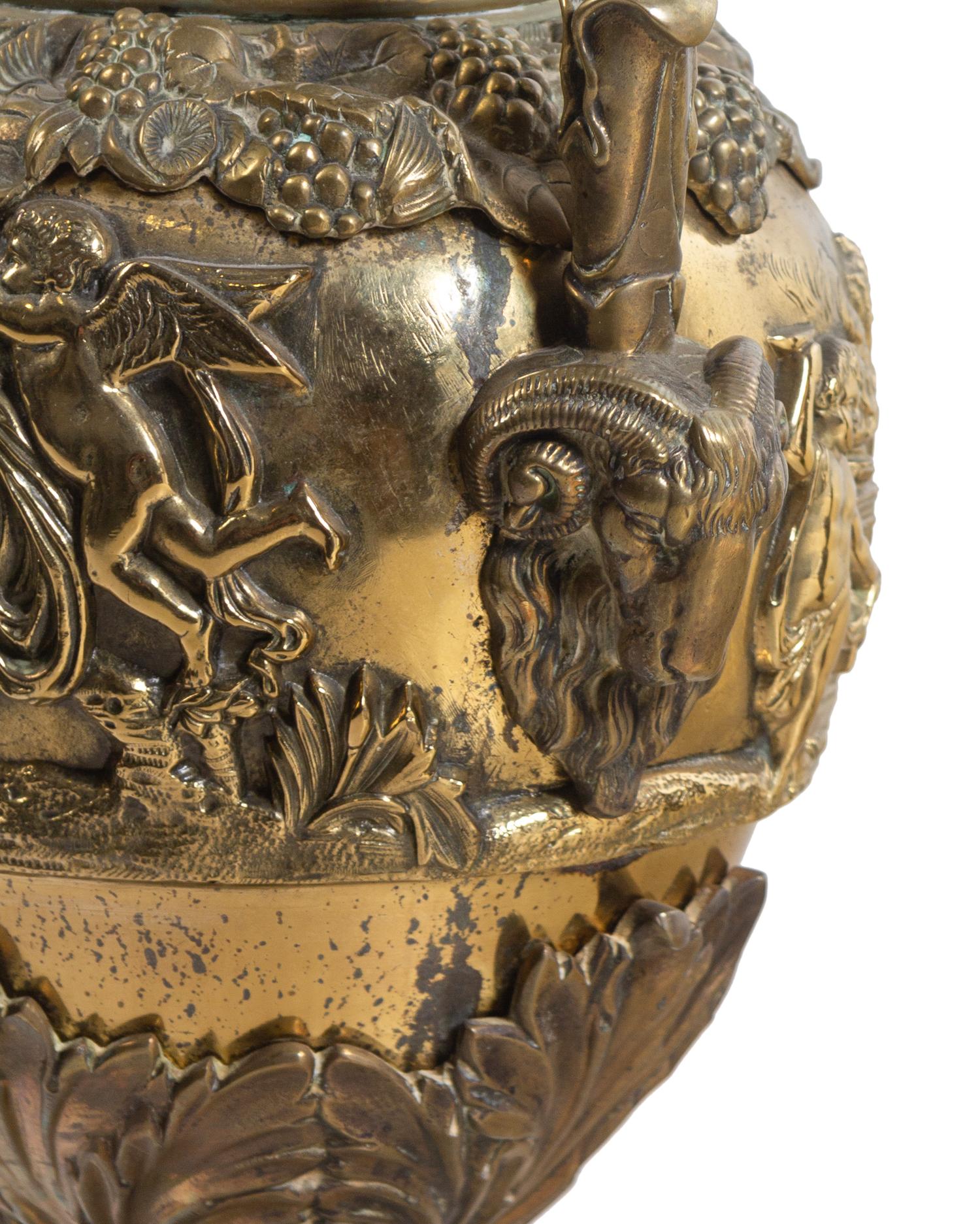 A Pair of Neoclassical Brass Ewers