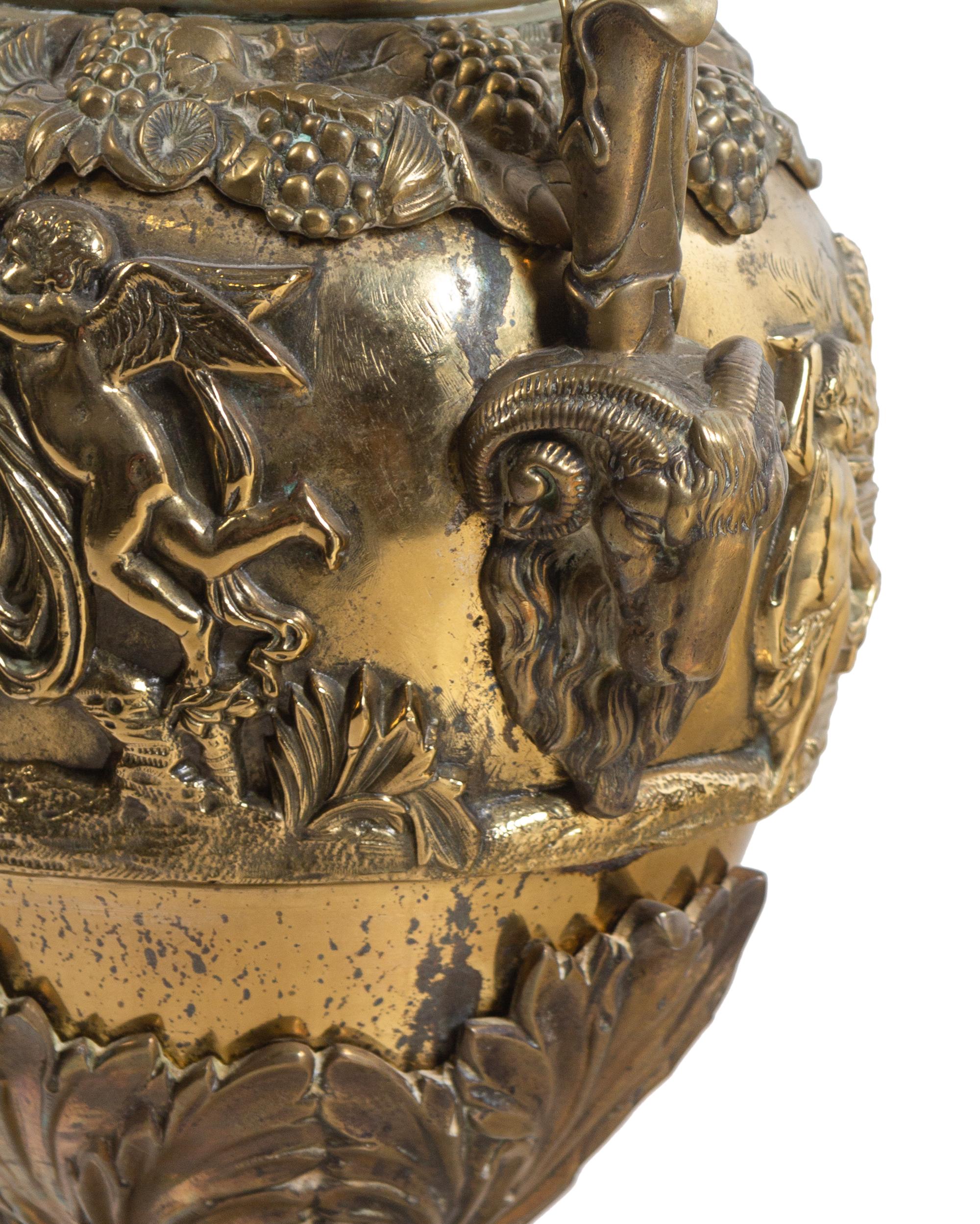 A Pair of Neoclassical Brass Ewers