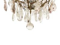 A Louis XV Style Gilt Bronze and Cut Glass Eight-Light Chandelier