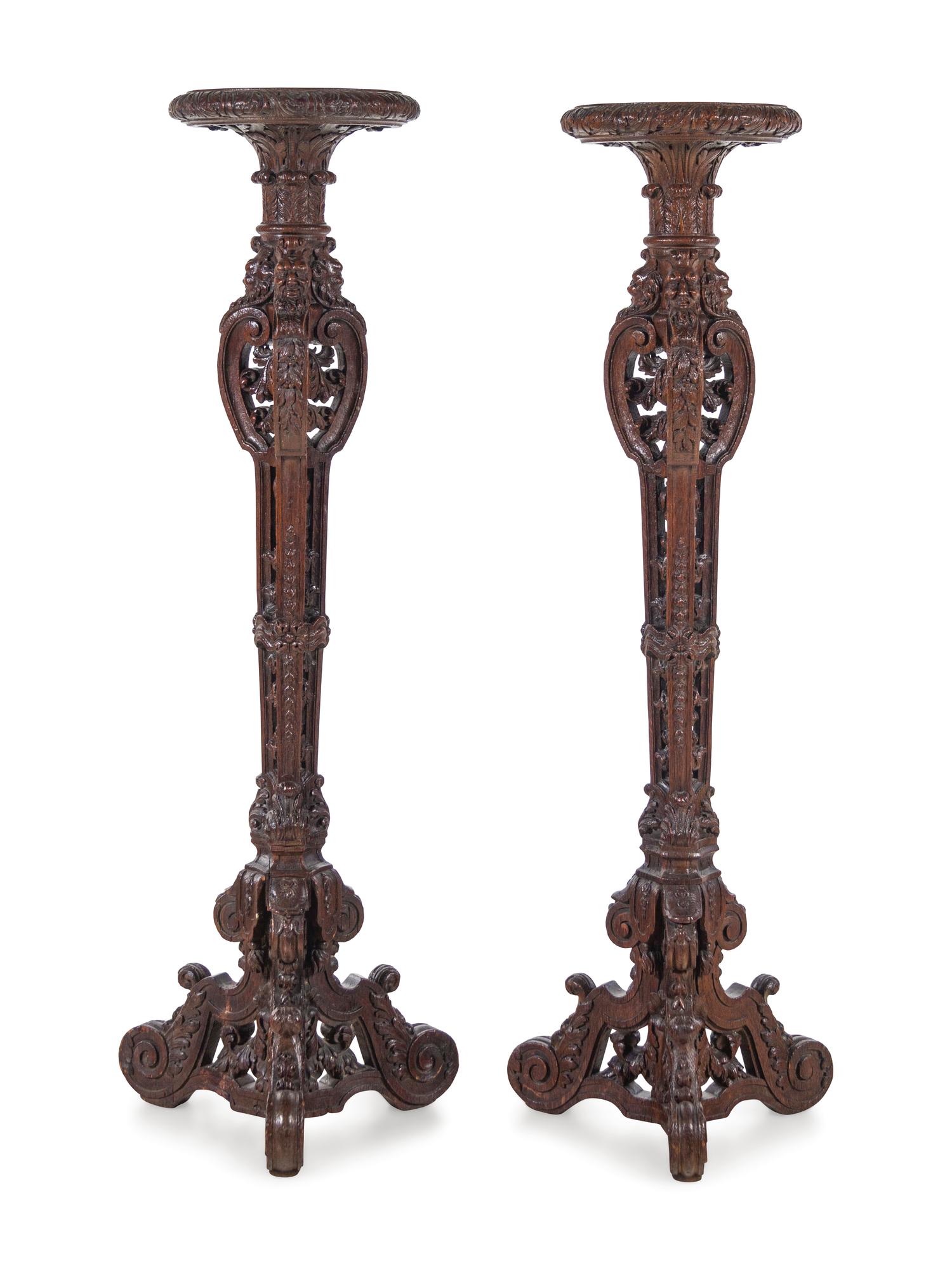 A Pair of Louis XIV Style Carved Oak Torchères