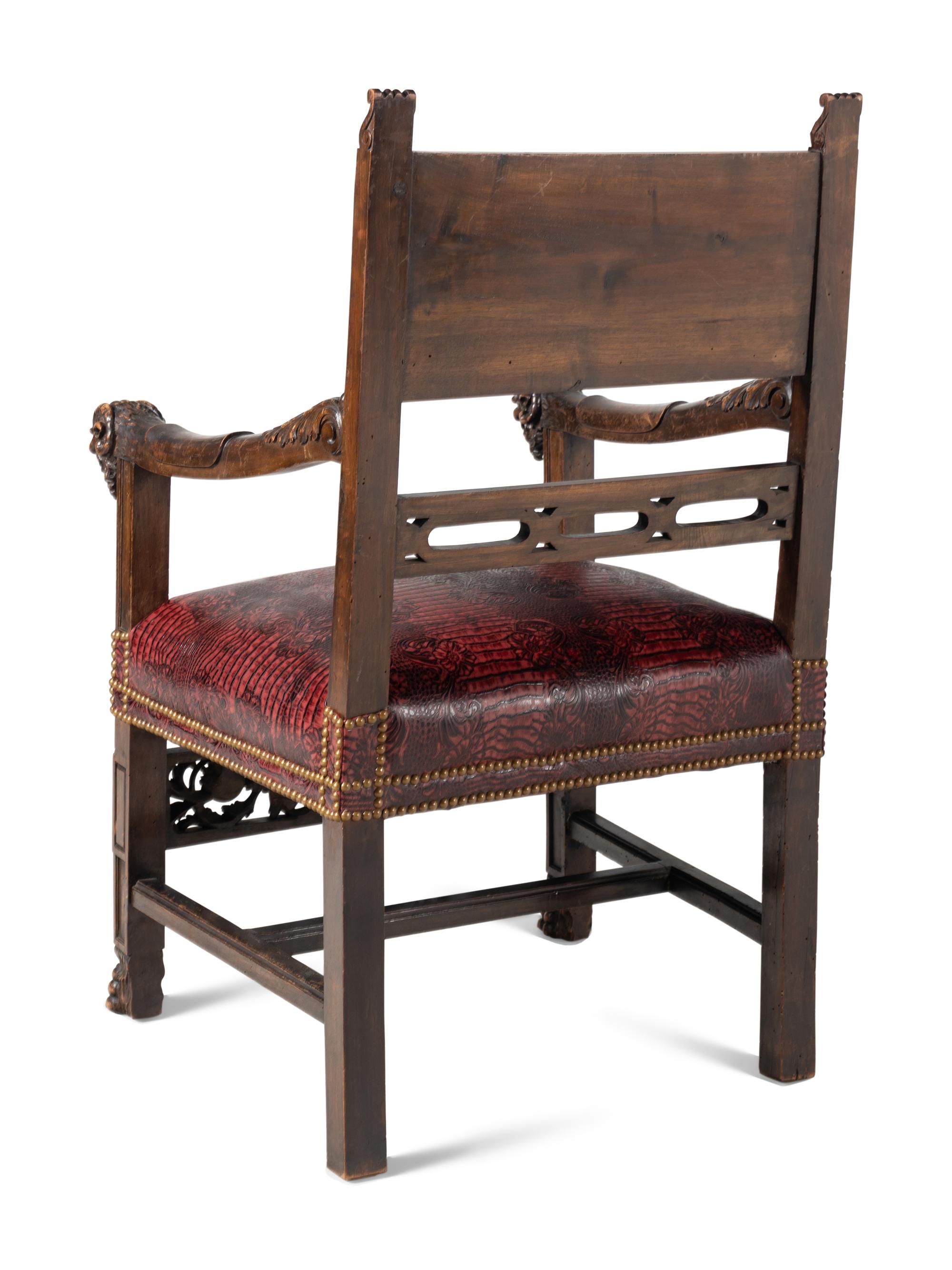 A Pair of Italian Renaissance Revival Carved Walnut Armchairs