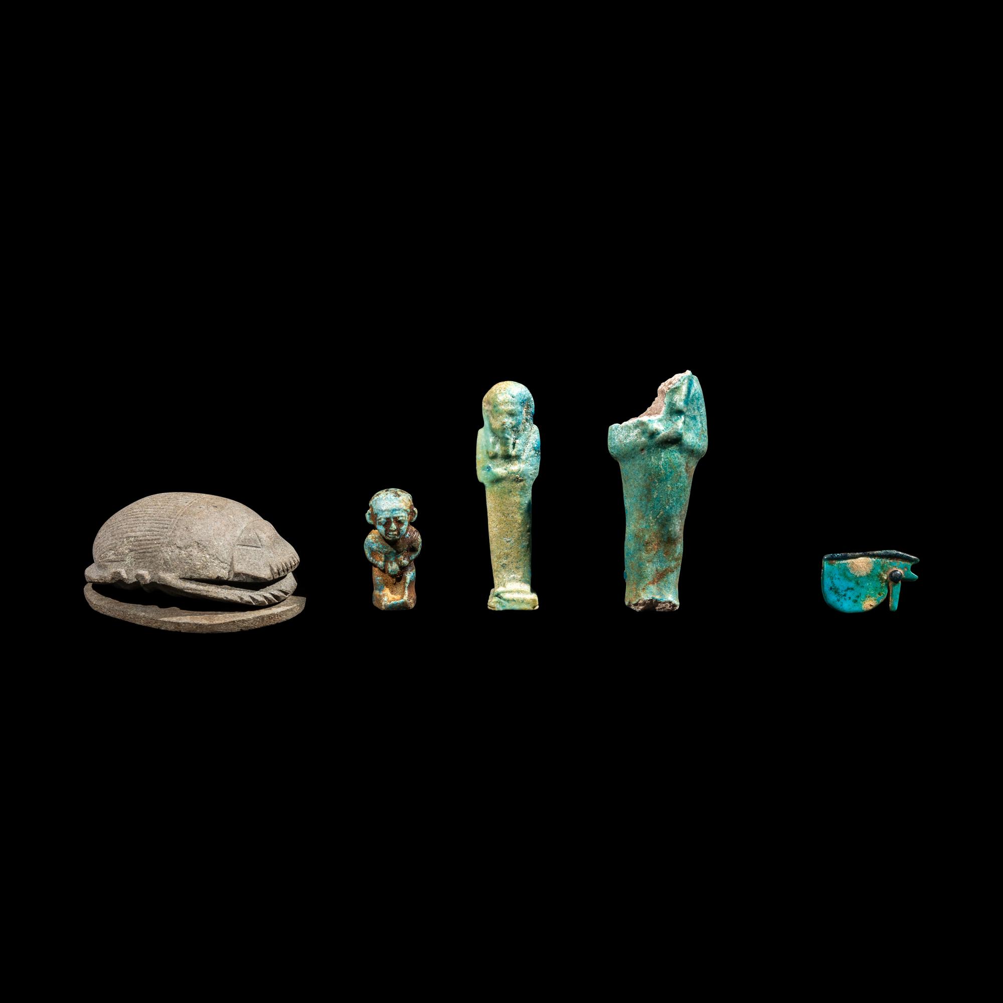 A Group of 5 Egyptian Stone and Faience Amulets