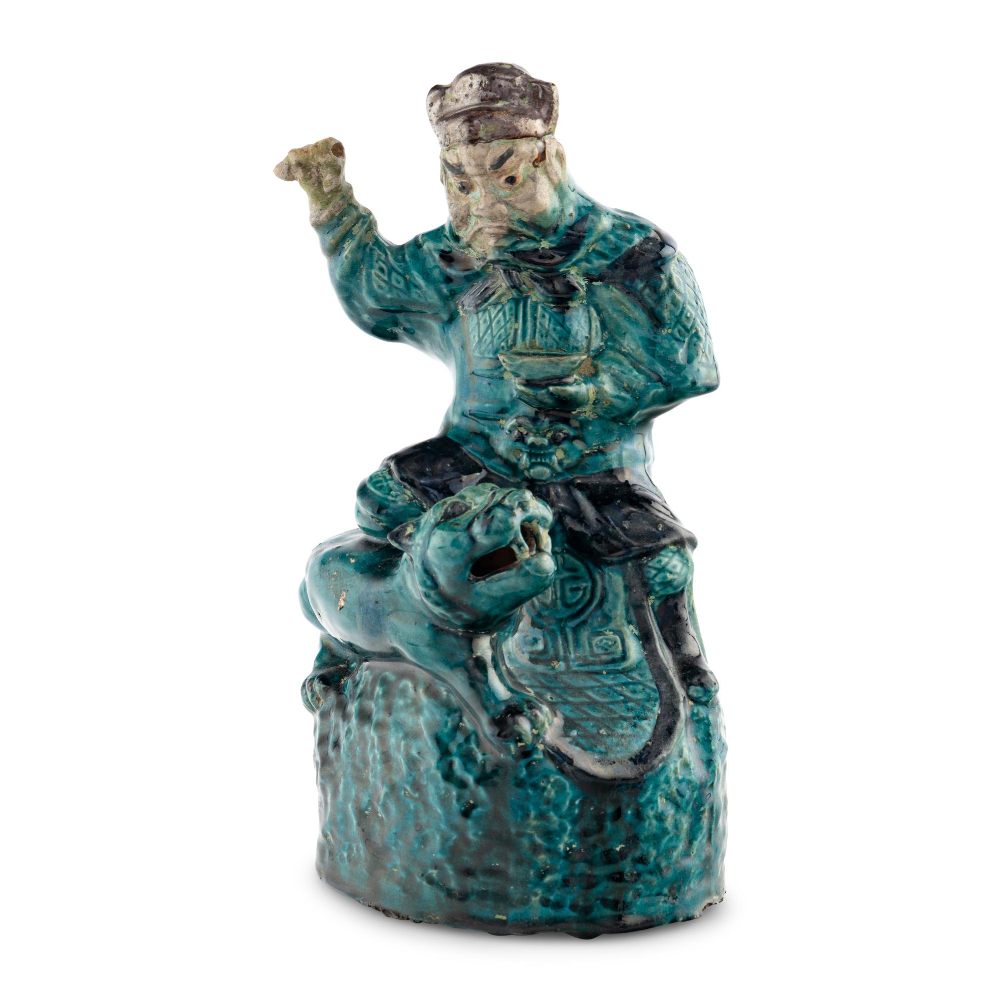 A Chinese Glazed Earthenware Figure